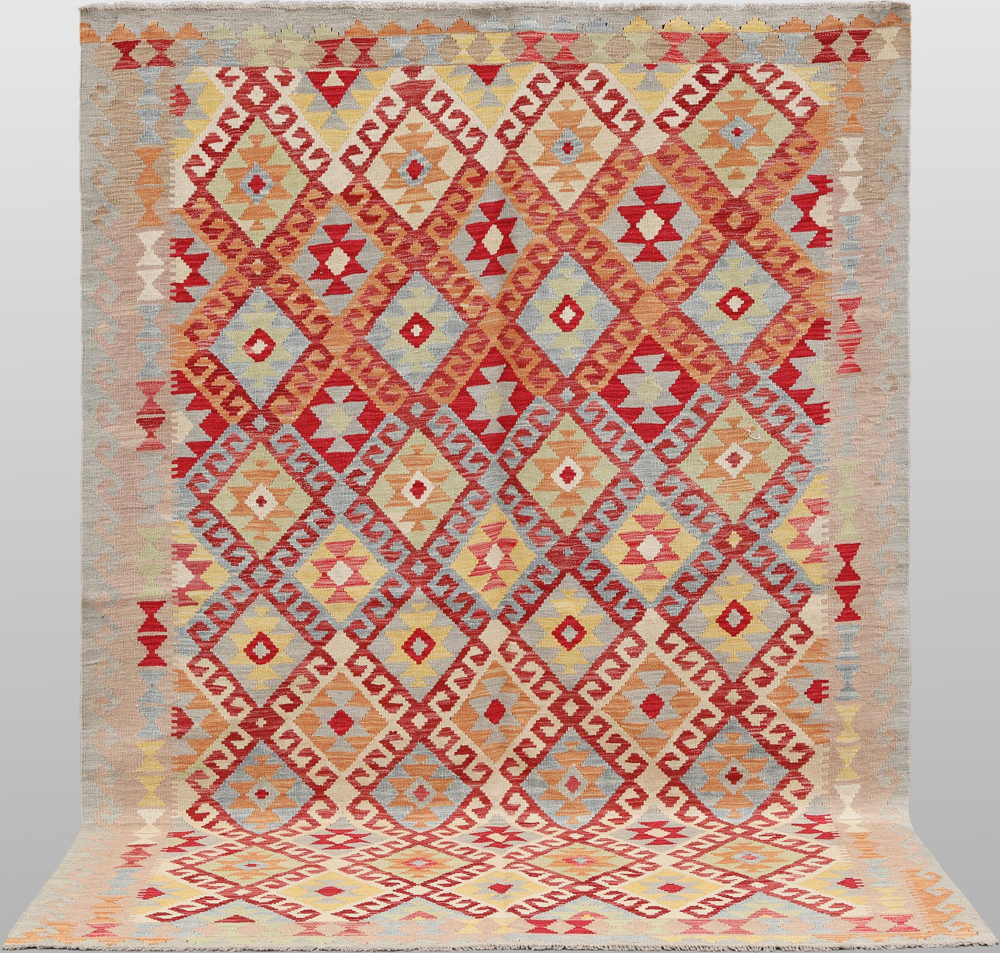 A Kilim rug, approx. 251 x 189 cm.