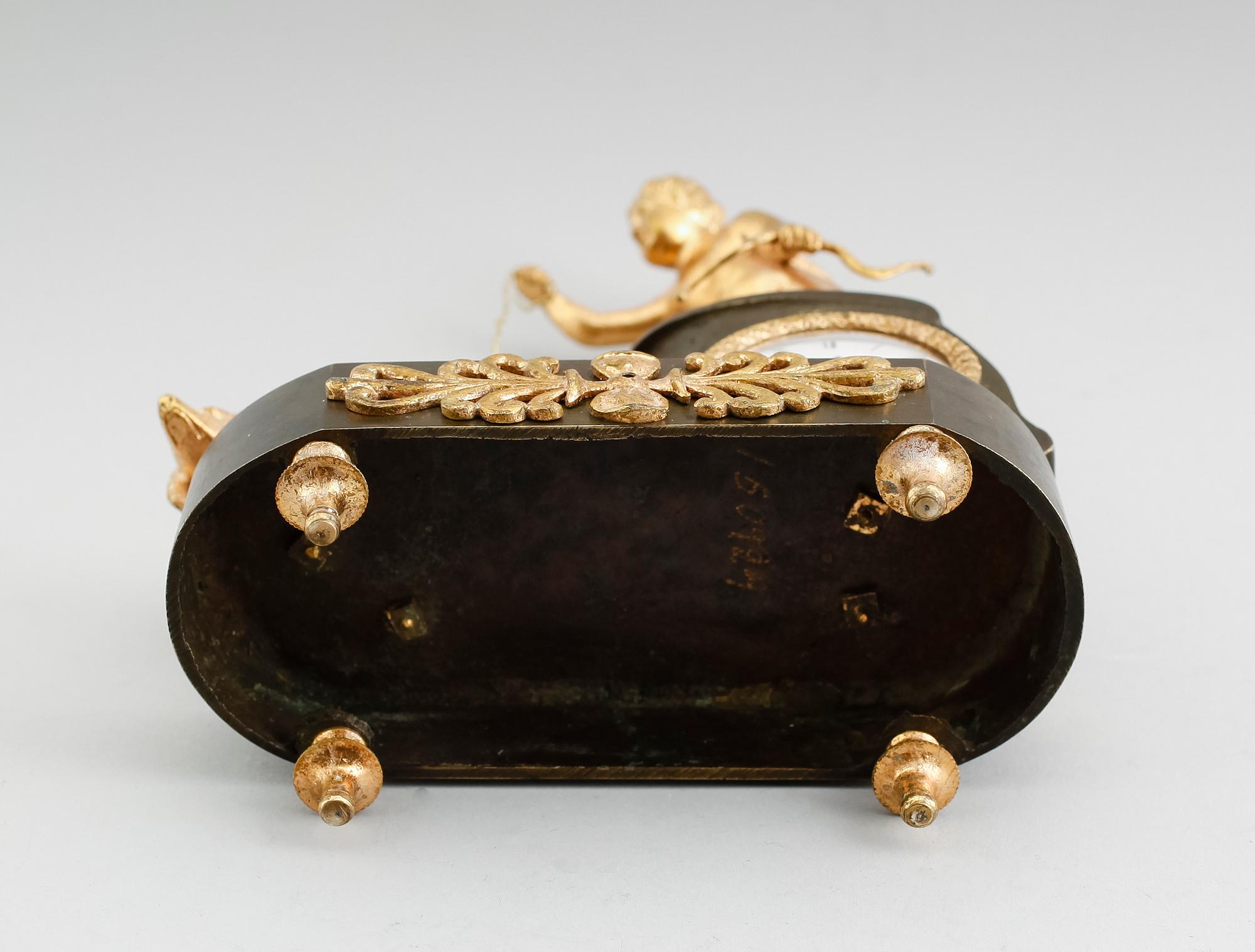 BORDSPENDYL, empire, brons, 1800-talets början.