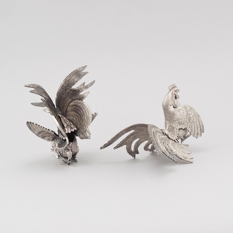 A pair of table decorations in white metal, second half of the 20th century.
