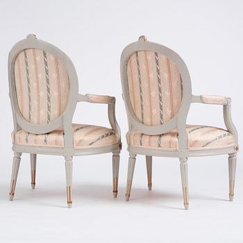 A pair of Gustavian carved armchairs, late 18th century.