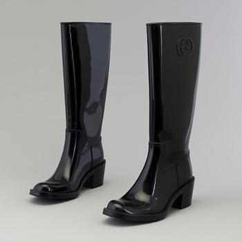 A pair of Gucci boots, size 36.