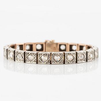 A bracelet set with rose-cut diamonds.