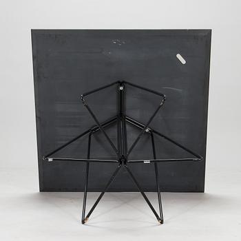 Lella and Massimo Vignelli, A "Paperclip" table in slate from Knoll 1994.