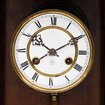 A neo renaissance German Junghans wall clock from around the turn of the 20th Century.