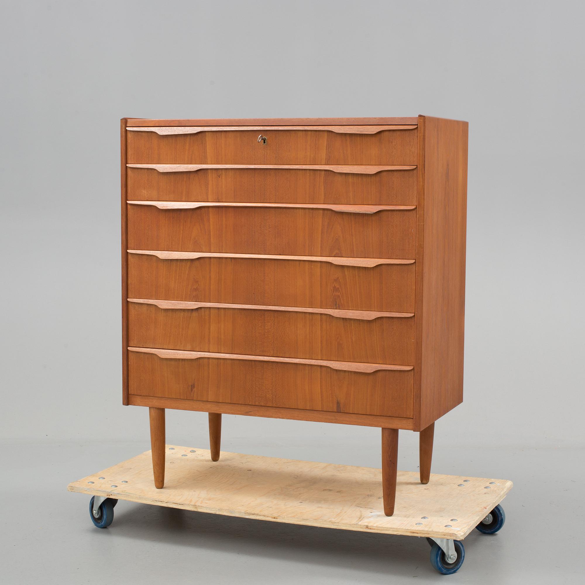 A danish teak chest of drawers from the middle of the 20th century.