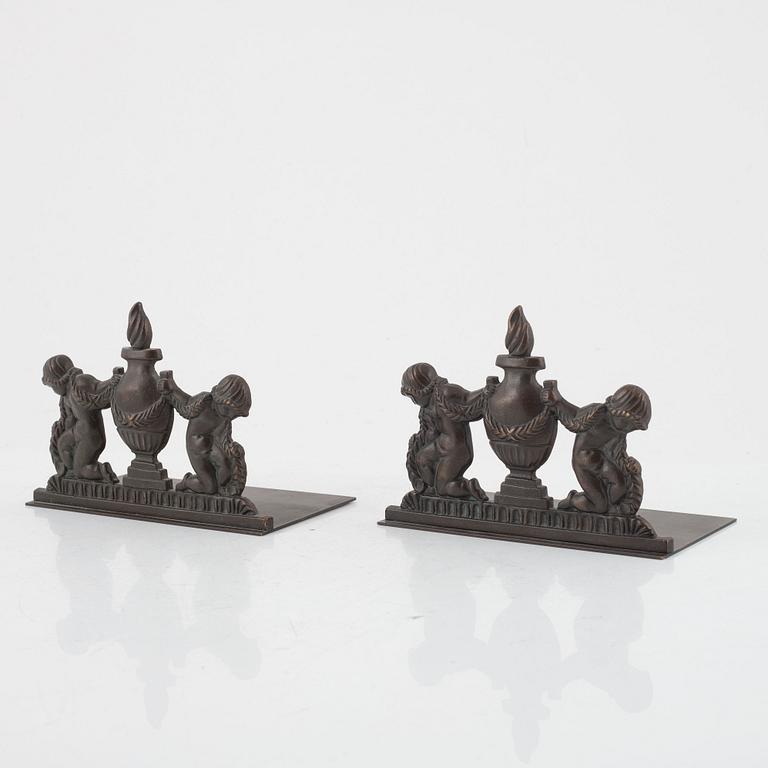 Oscar Antonsson, a pair of bronze book rests, Ystad Metall, Sweden, first half of the 20th century.