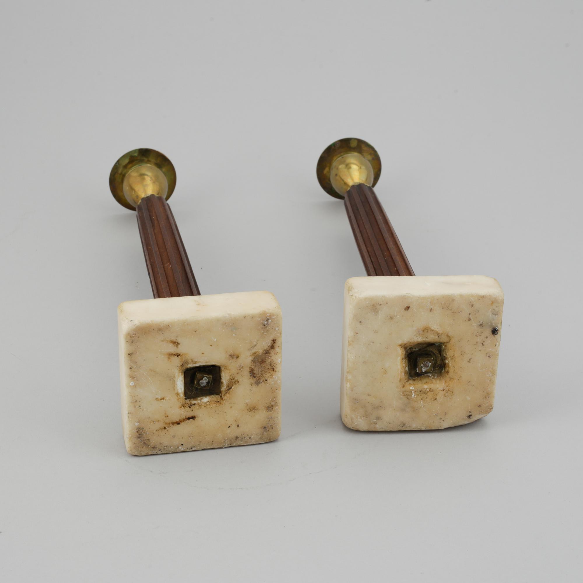 A pair of late Gustavian late 18th-century candlesticks.