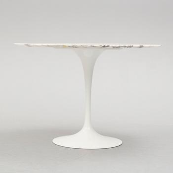 a 'Tulip' table by Eero Saarinen, Knoll Studio, 1956.