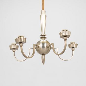 A 1920's Swedish Grace pewter ceiling lamp.