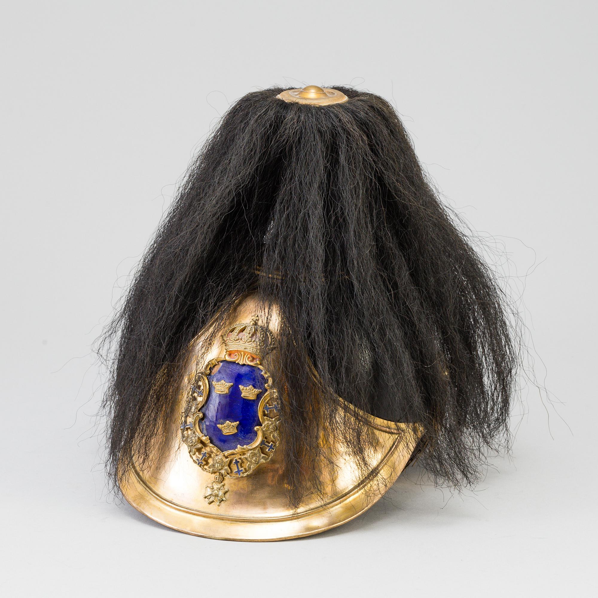 A Swedish military 
officer helmet m/1894.