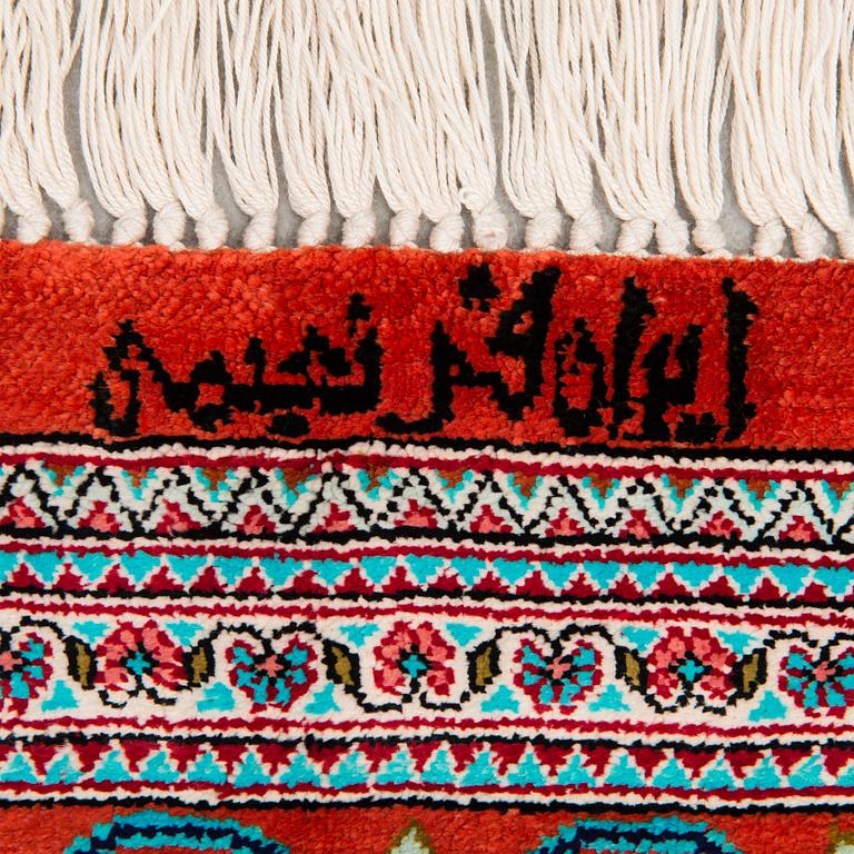 A signed Qum silk rug, old, 193x130 cm.