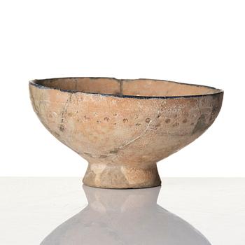 A central Asian pottery bowl,  13th century.