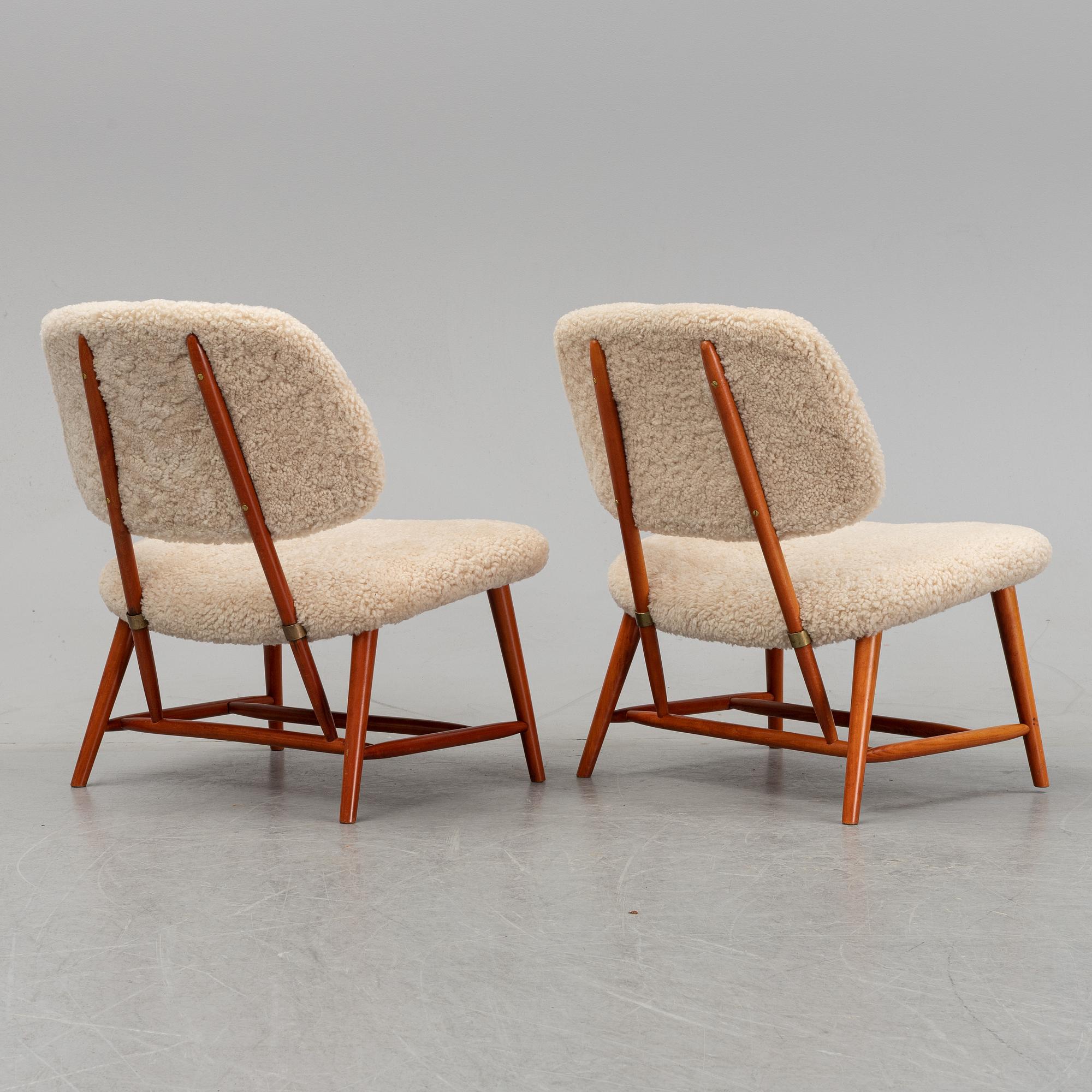 A 1950's pair of 'TeVe' easy chairs by Alf Svensson.