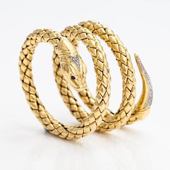 Chimento, An 18K gold snake bracelet with rubies and diamonds ca. 0.46 t in total. Italy.