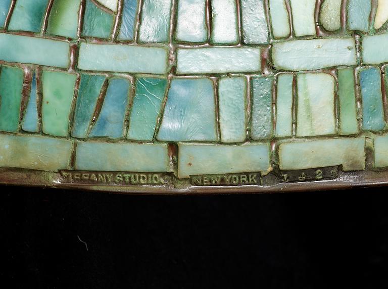 A Tiffany Studios Art Nouveau 'Daffodils' bronze base table lamp, New York circa 1910-15.