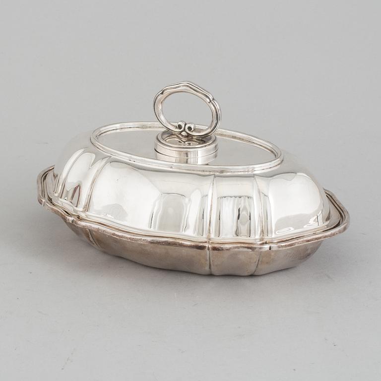 A silver plated lidded pan.