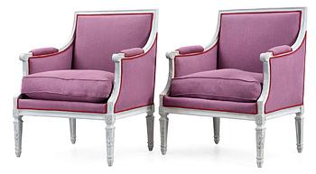 448. A pair of Louis XVI late 18th Century armchairs.