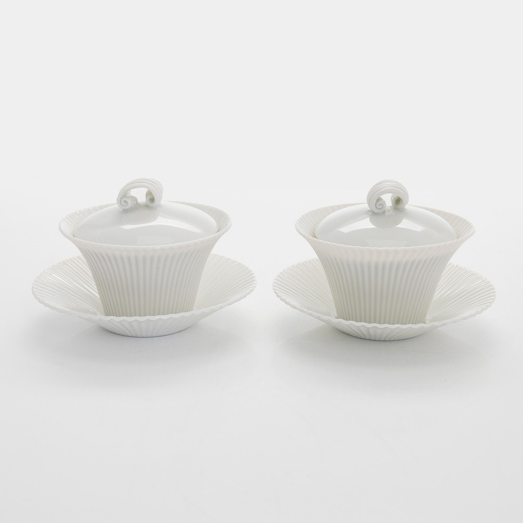 Aune Siimes, twelve porcelain custard cups signed AS ARABIA, 1950s/60s.