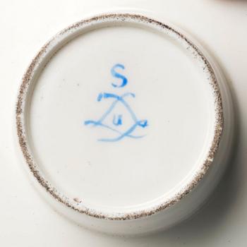 A French 'Sèvres' cup and tremleuse saucer, 19th Century.