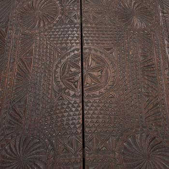 A late 18th or early 19th century wooden box on a stand from early 20th century.