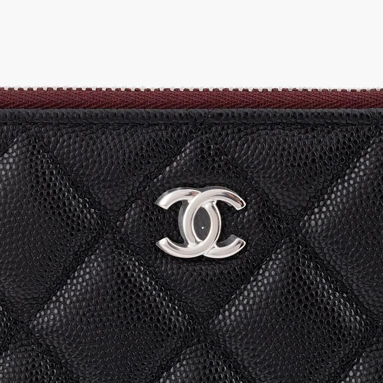 Chanel, a black caviar leather clutch, 2020.