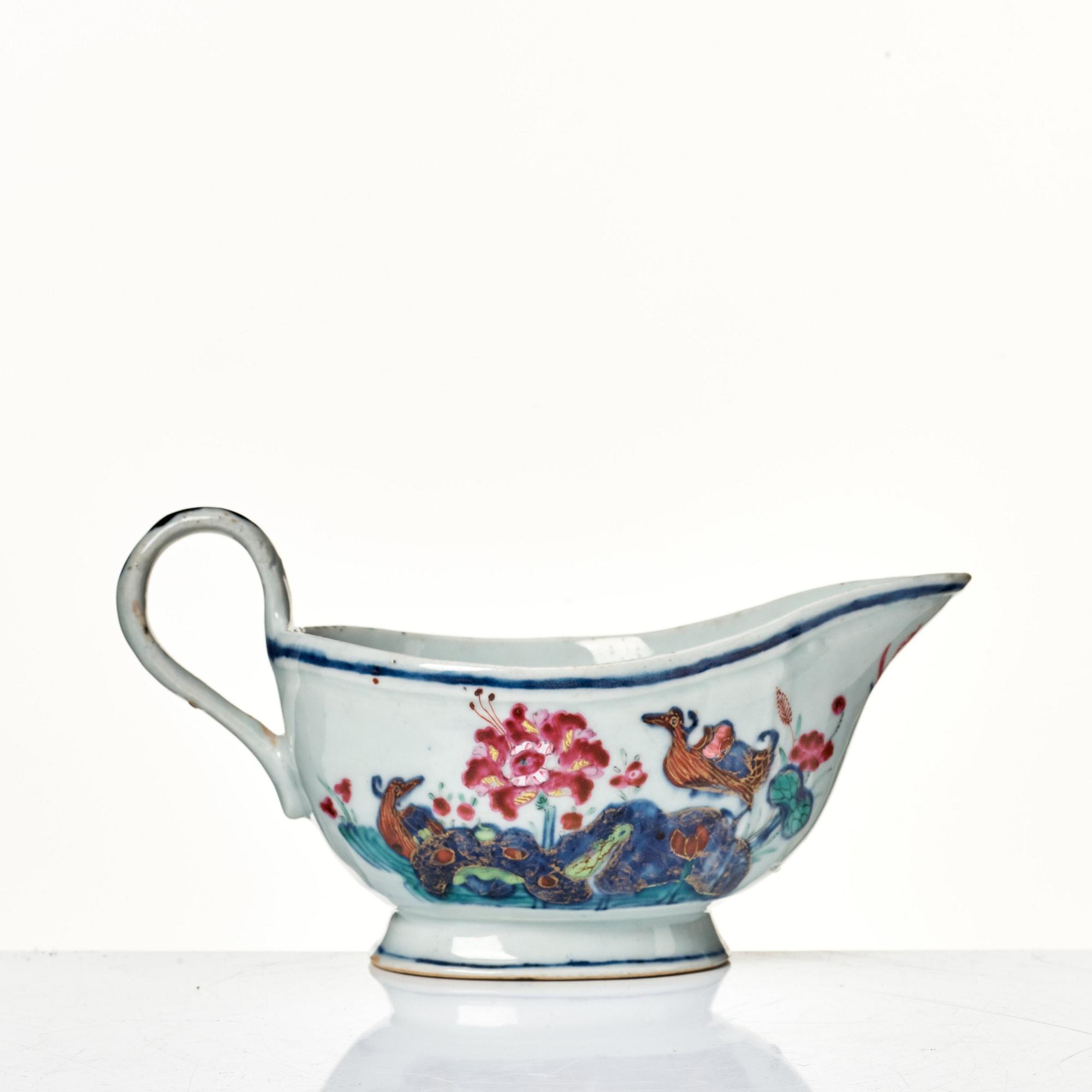 A famille rose "tobacco leaf" sauce boat, Qing dynasty, Qianlong (1736-95).
