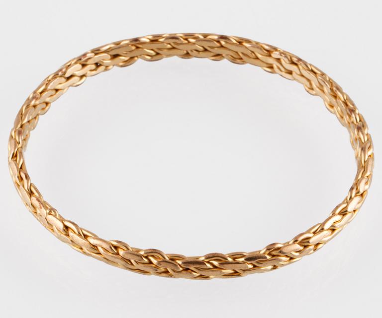 ARMRING, 10K guld, utländsk stämpel. Vikt 24,8 gram.