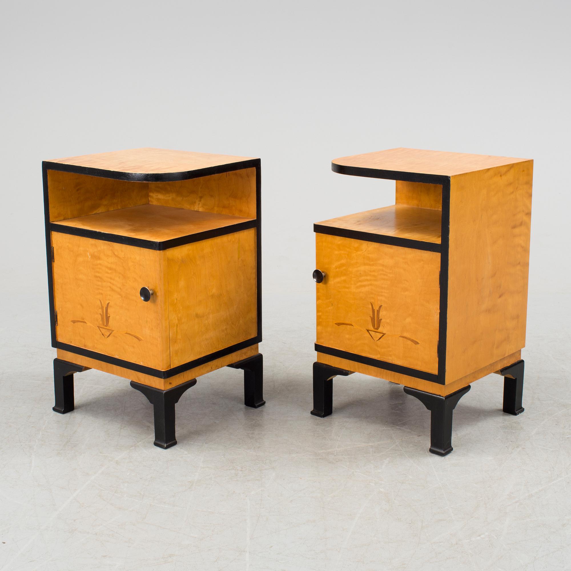 A pair of art déco bedside tables.