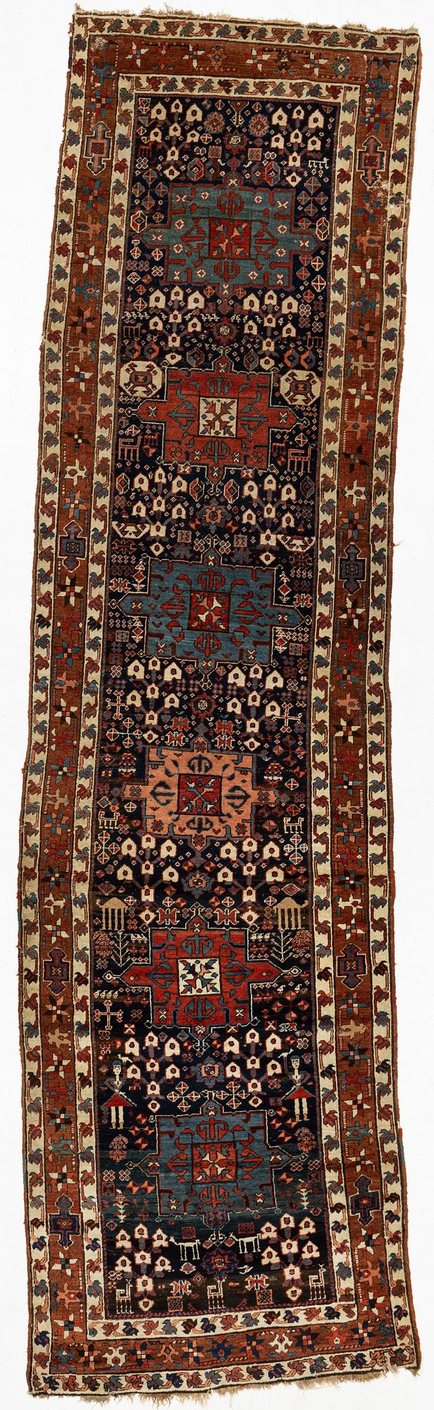 A persian gallery carpet, ca 400 x 110 cm.