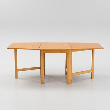 A gate-legged table by Nordiska Kompaniet 1956.