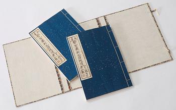 Book, two vol, with 100 woodcuts in colours, after paintings by Qi Baishi among others.
