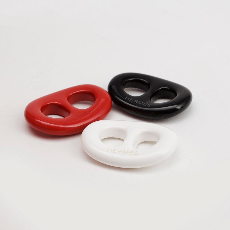 HERMÈS, three scarf rings.