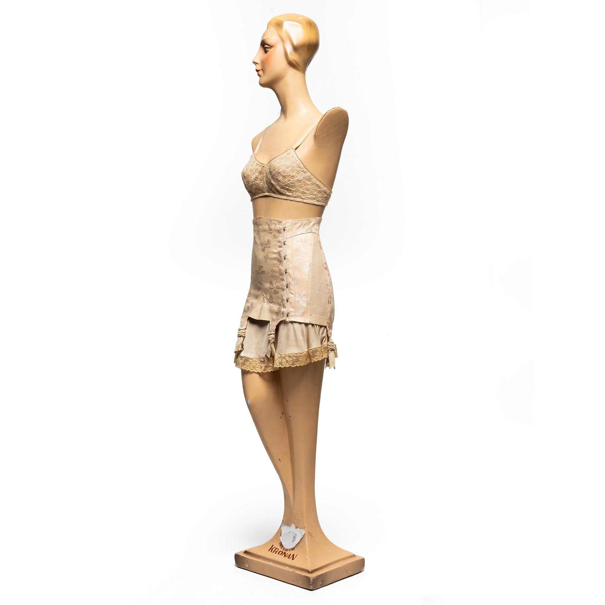 A 1930's storefront mannequin.