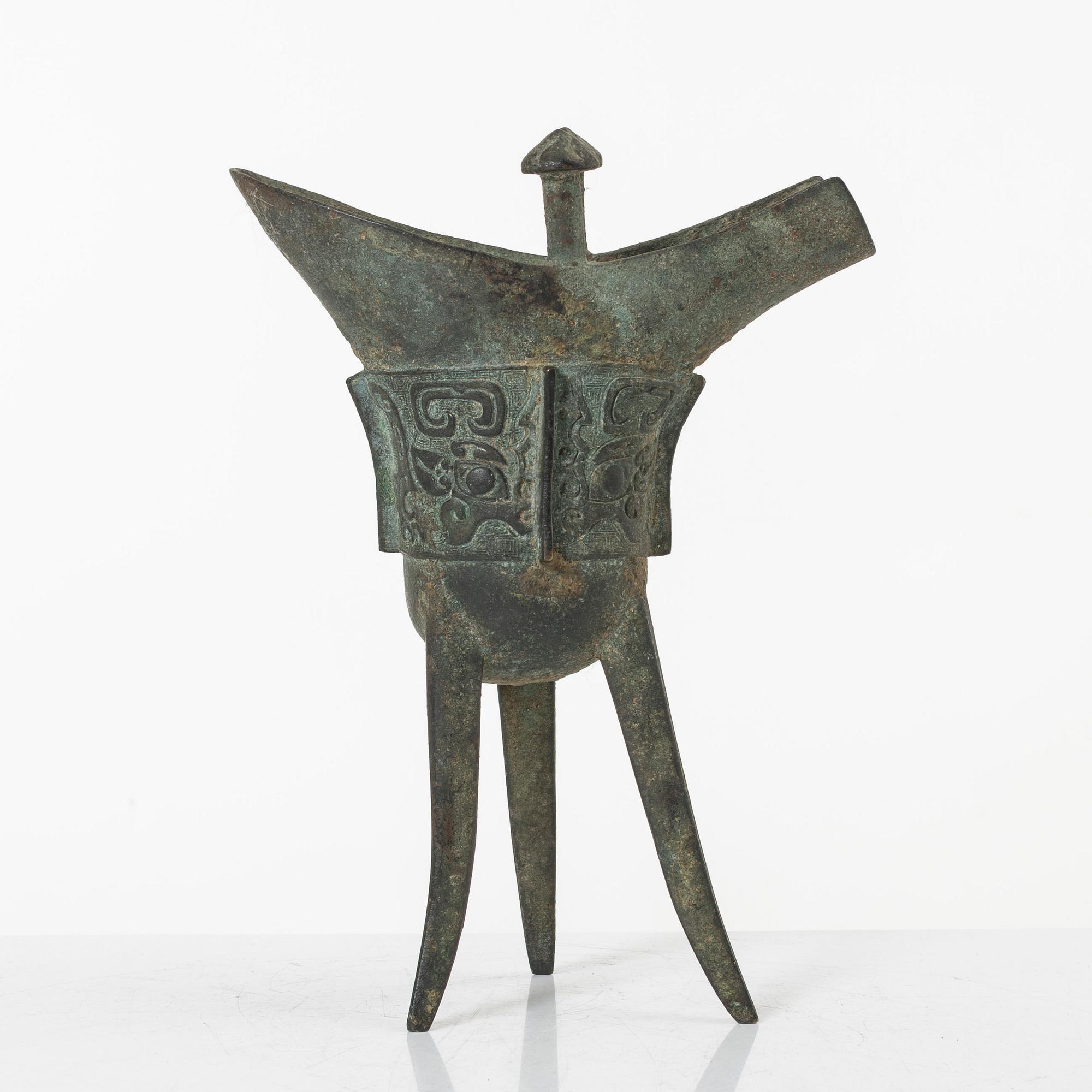 An archaisitic bronze Jue vessel, Qing dynasty.