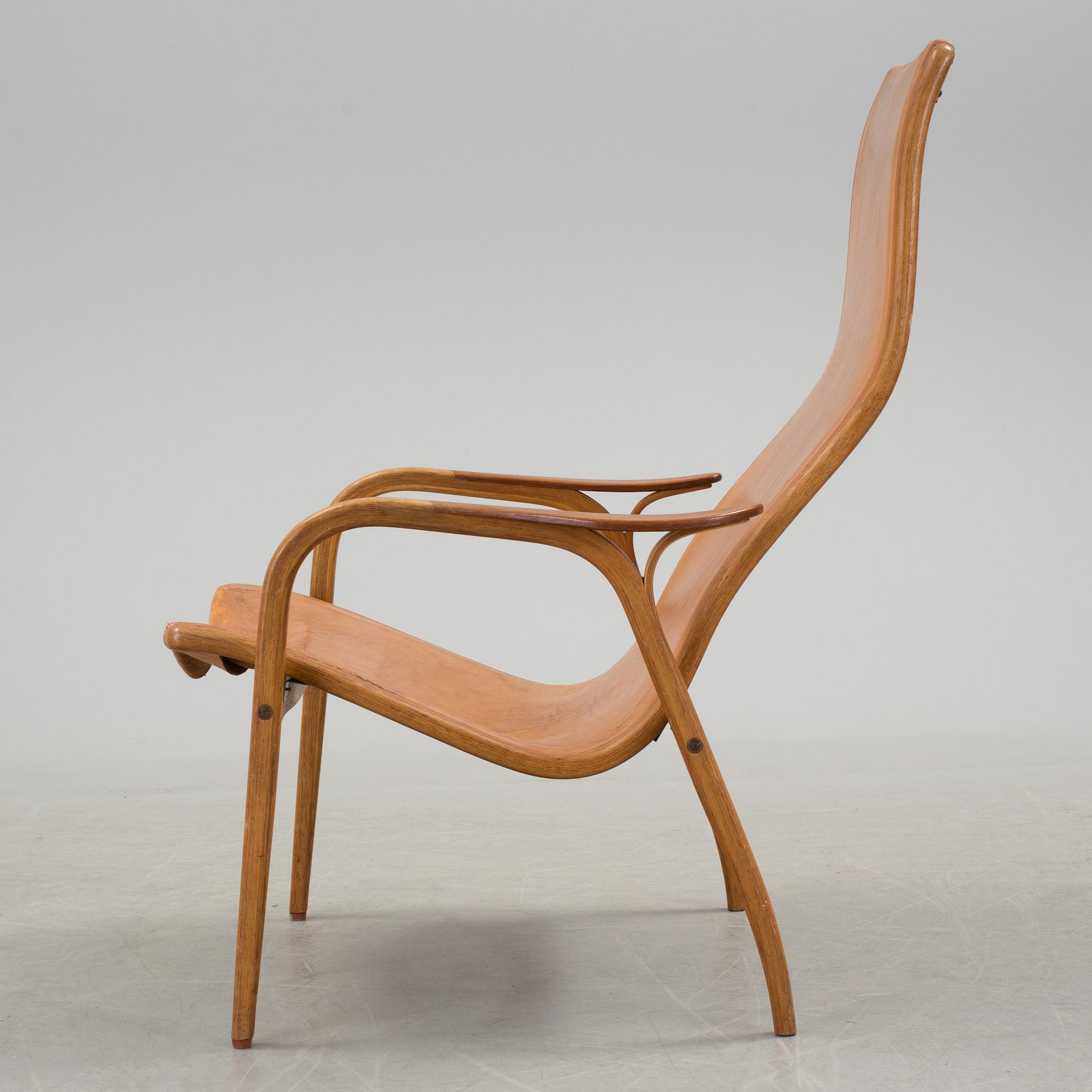 YNGVE EKSTRÖM, a 'Lamino' oak and teak easy chair from Swedese.