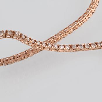 ARMBAND, 18K roséguld med briljantslipade diamanter ca 2.15 ct. Vikt 7,2 gram.