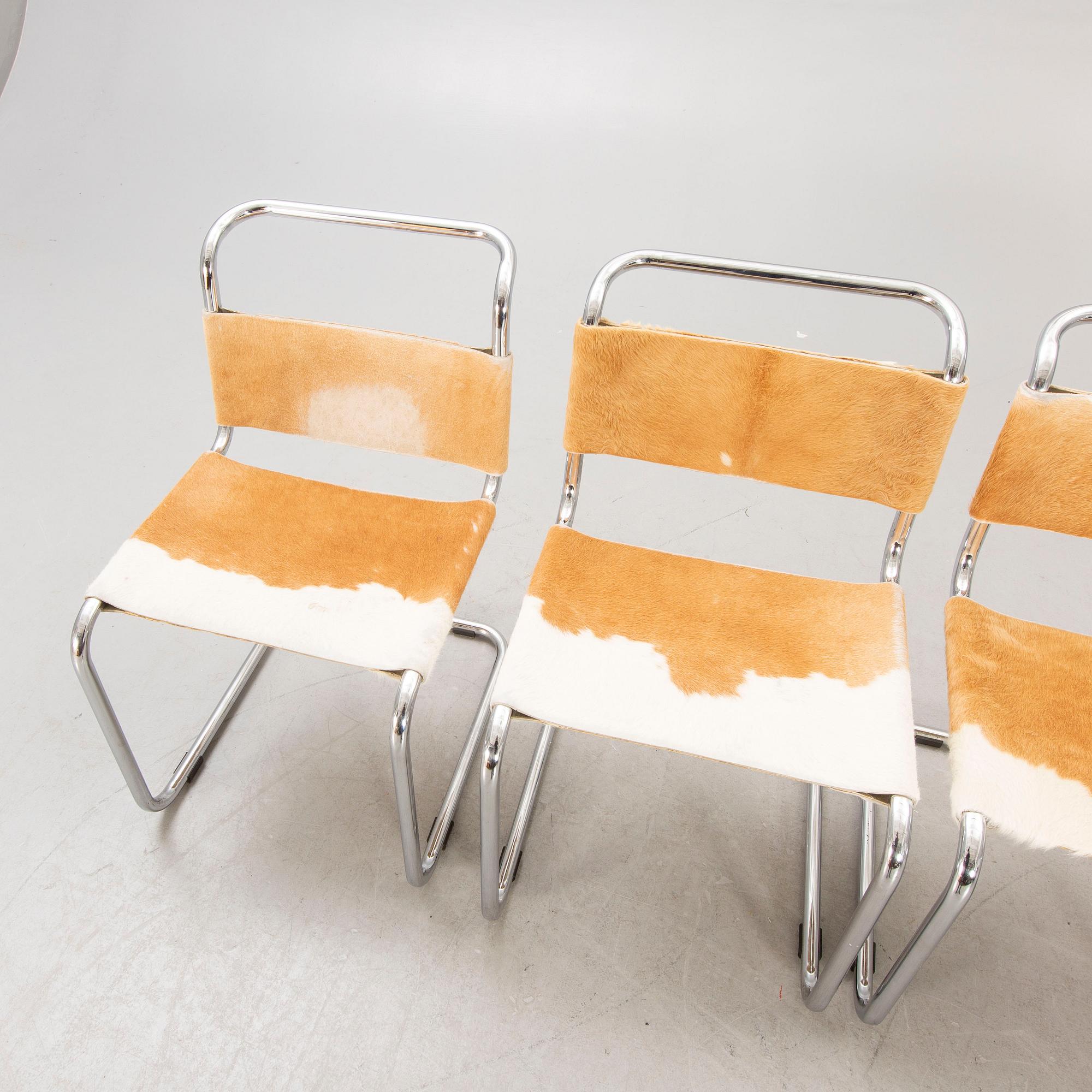 A set of four Italian chrome and cow skin later part of the 20th century.