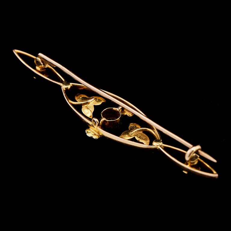 BROSCH, 14k guld med fasettslipad syntetisk akvamarin samt 11 odlade pärlor, 1900-talets mitt. Vikt 4 g.