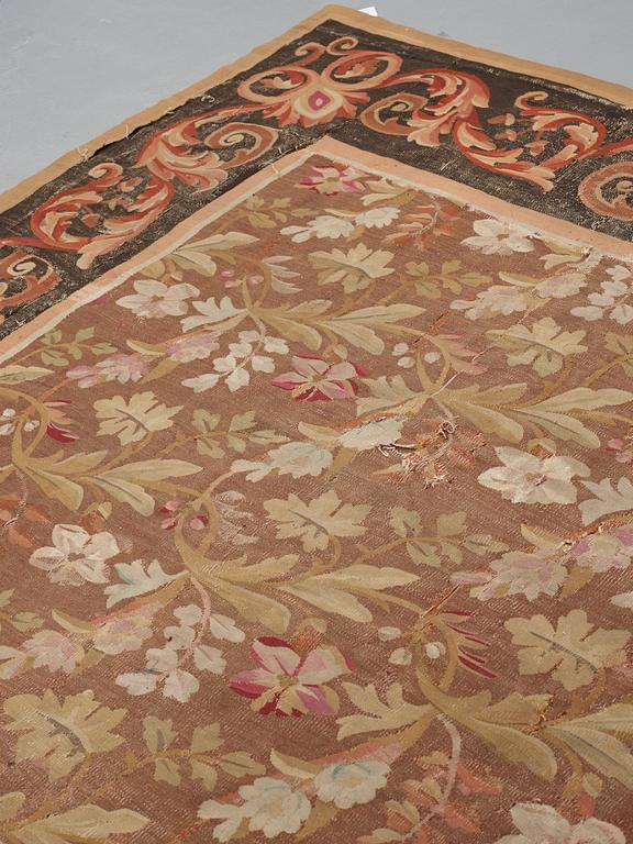 A CARPET, tapestry weave, ca 415,5-419 x 392-396 cm, Aubusson, France, the age of Louis Philippe, around 1840.