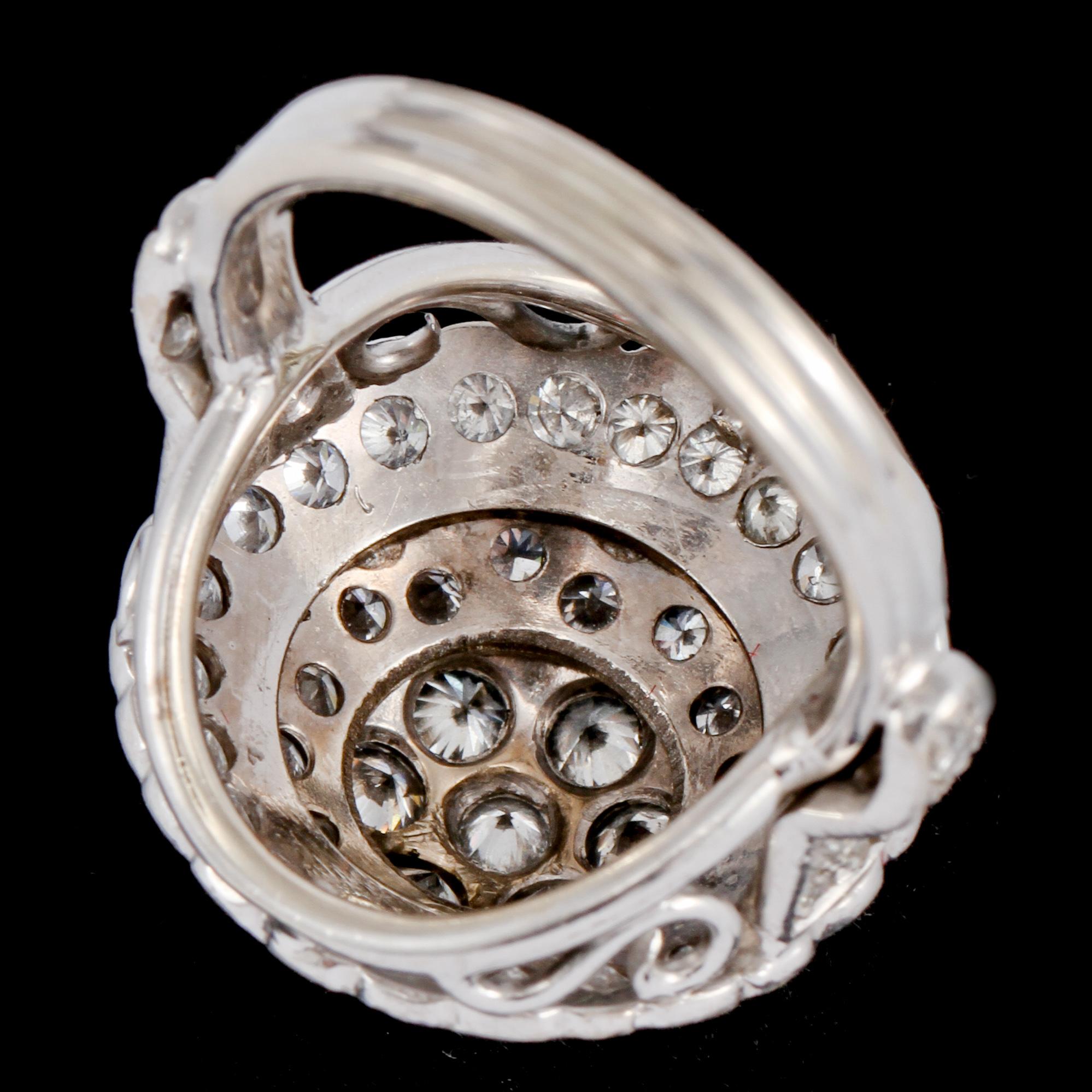 RING, 14k vitguld med 63 briljantslipade diamanter, tot ca 4.7 ct, 2000-tal. Vikt 11 g.