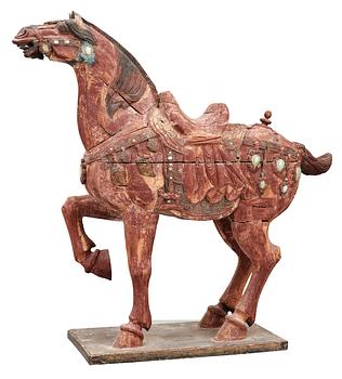 A large jade and agathe inlayed wooden carparisoned sculpture of a horse, presumably Ming dynasty.