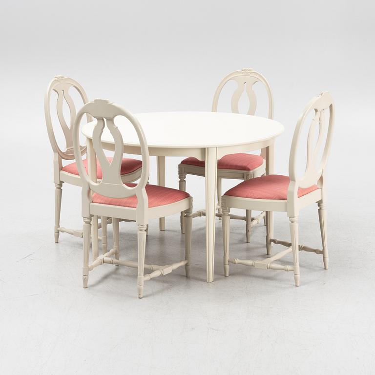A Gustavian style table with four chairs, second half of the 20th century.