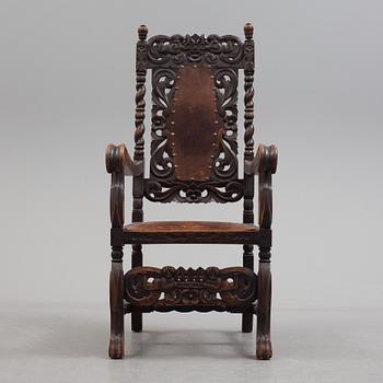 A 19th century baroque style armchair.