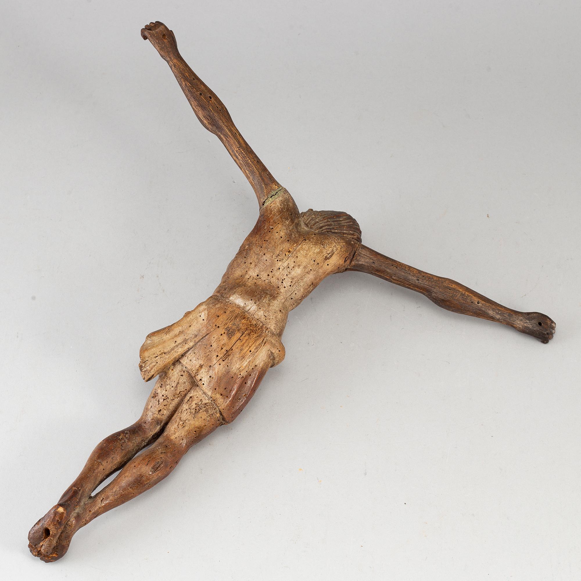 A carved wood crucifix, 18th/19th century.