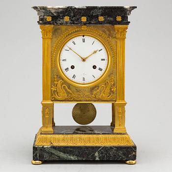 A French mantel clock, first half of the 19th century.
