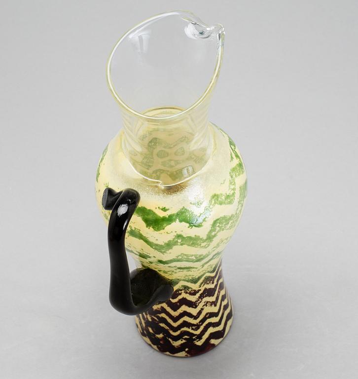 KJELL ENGMAN, A GLASS DECANTER, Kosta Boda, signed and numbered.