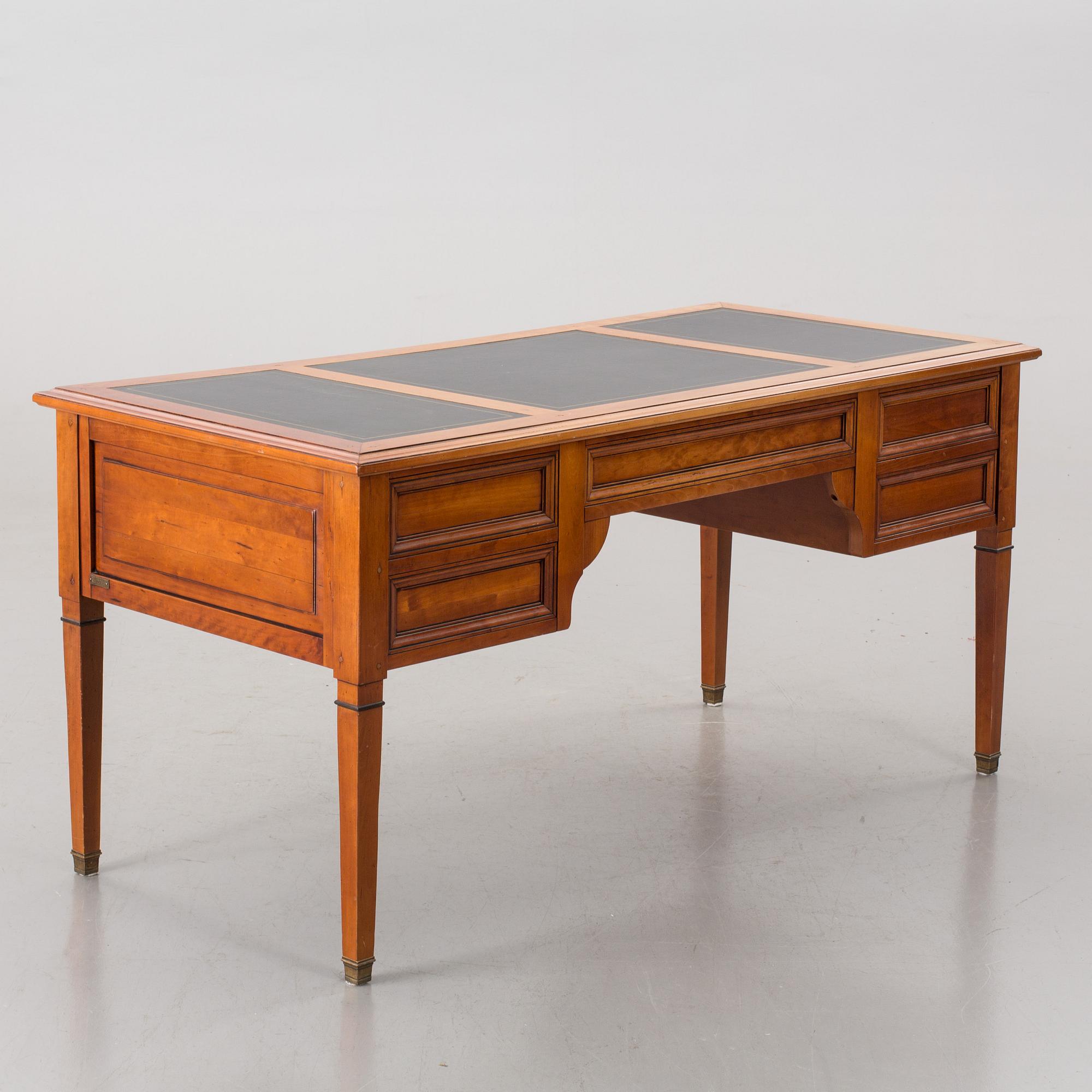A FRANCE WRITING DESK AND A CHAIR FROM GRANGE.