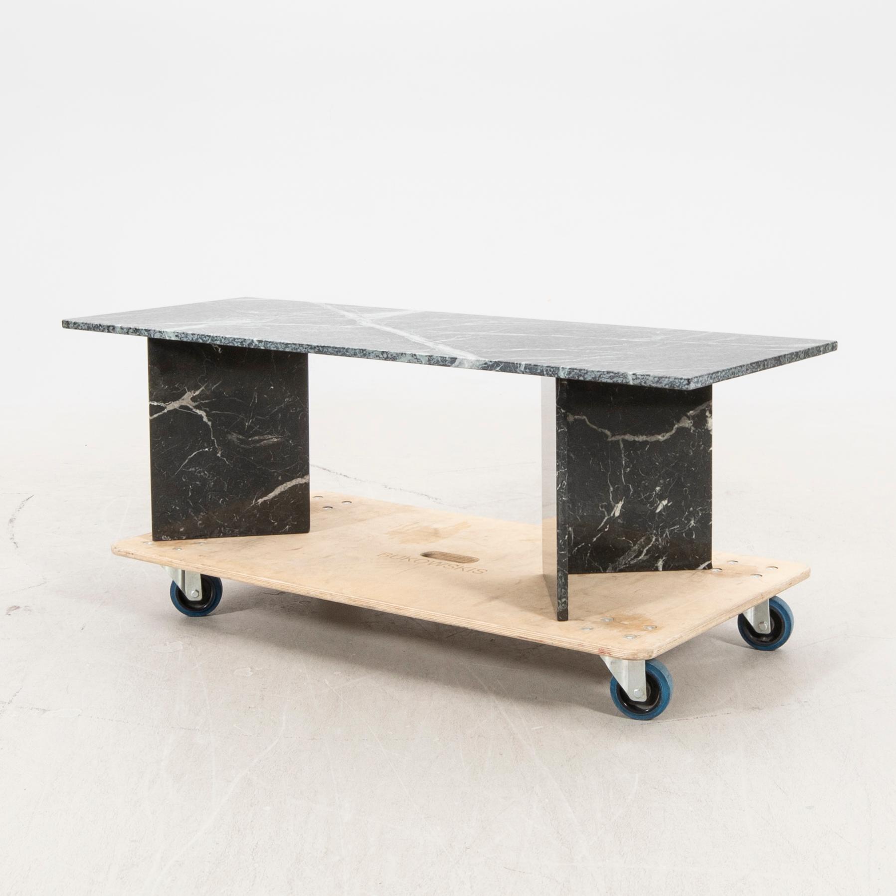 A marble coffee table alter part of the 20th century/21st century.