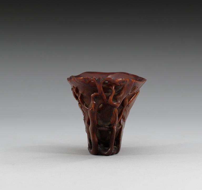 A rhinoceros horn libation cup, Qing dynasty, Kangxi (1662-1722).