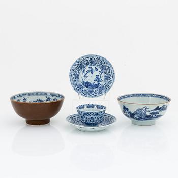 Two blue and white bowls, and a cup with two stands, Qing dynasty, 18th Century.